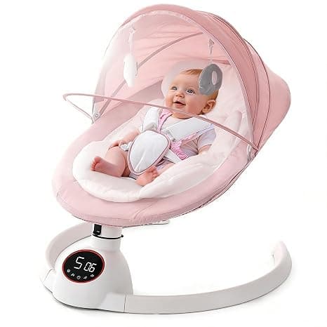 Baby resting inside a pink electric baby swing with a white base, digital display, 5-point harness, and canopy with hanging toy.